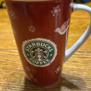 Starbucks 2008 ceramic 16 ounce Christmas mug. Red with white winter scene.